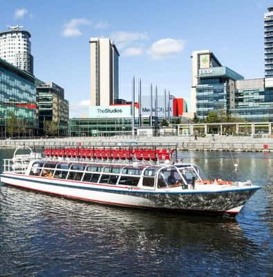 Cruise boat on the water at Salford Quays