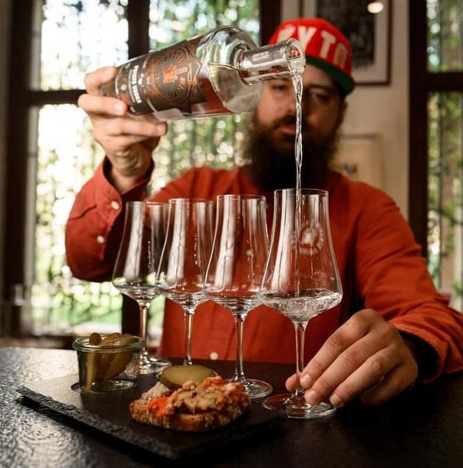 Bartender pouring vodka samples in Gdansk