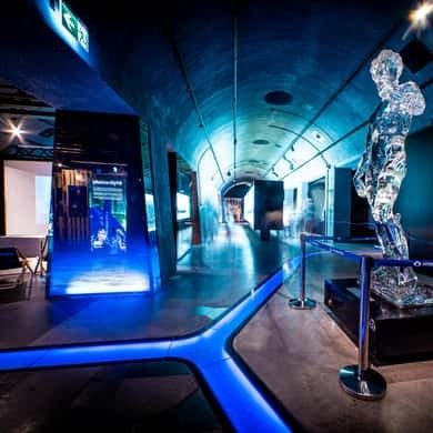 Blue-lit exhibition hall inside Hydropolis in Wroclaw
