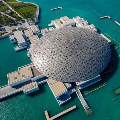 Silver latticed dome of the Louvre Abu Dhabi