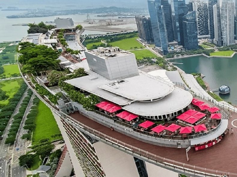 Aerial view of the Marina Bay Sands rooftop and Singapore skyline