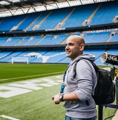 Visitor on the pitch side at the Etihad Stadium