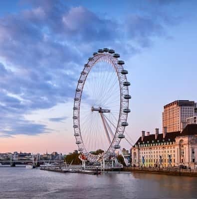 The London Eye on the Thames at dusk