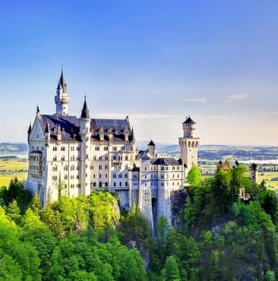 Neuschwanstein Castle on its forested hill