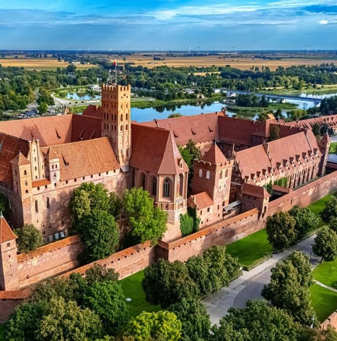 Aerial view of Malbork Castle beside the Nogat river