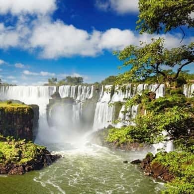 Iguazu Falls with a rainbow seen from the Argentine walkways