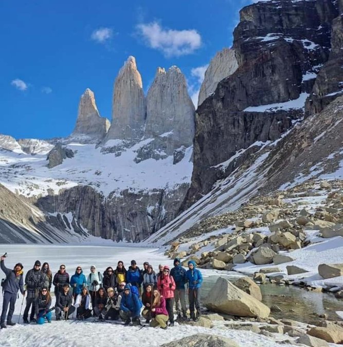 Group gathered below the Torres del Paine towers