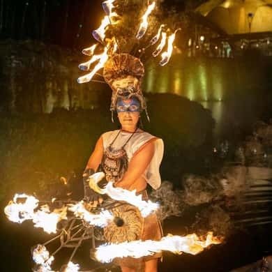 Fire performer in costume at Cirque du Soleil JOYÀ
