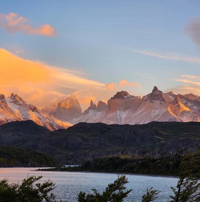 Paine massif glowing at sunrise over the lake