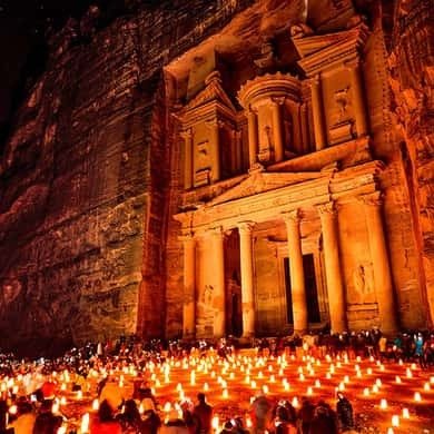 The Treasury at Petra lit by hundreds of candles at night