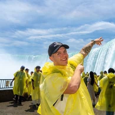 Visitors in yellow ponchos on the viewing deck at Niagara Falls