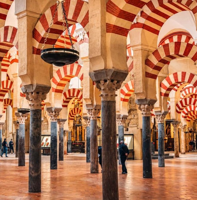 Red and white arches of the Mezquita in Córdoba