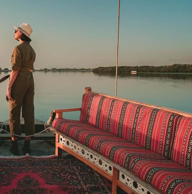 Traditional boat on calm water at the Ras Al Khaimah pearl farm
