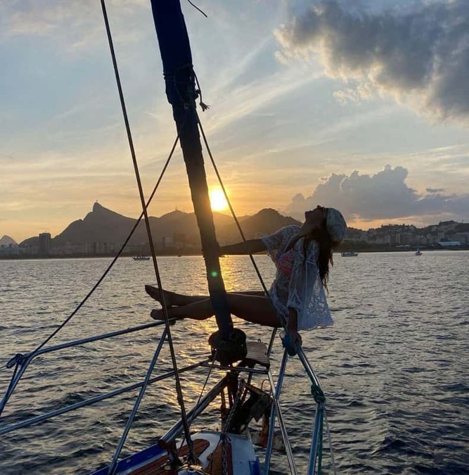 Sailboat at sunset on Guanabara Bay
