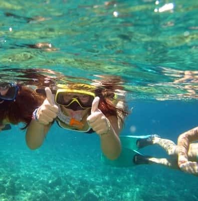 Snorkeler in turquoise water off the Riviera