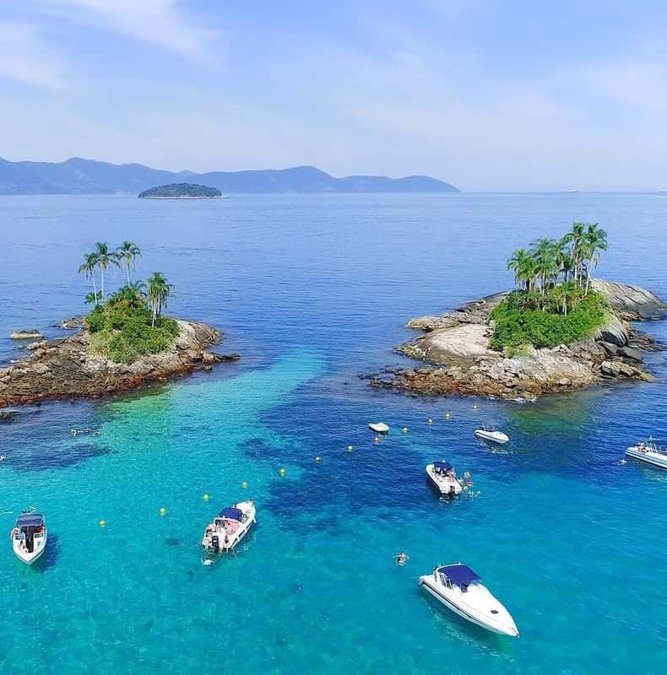 Green islands and boats in the bay of Angra dos Reis