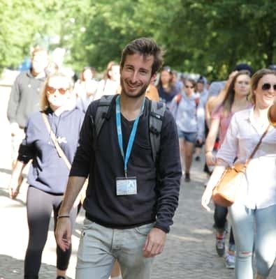 Guide leading a walking tour through Berlin