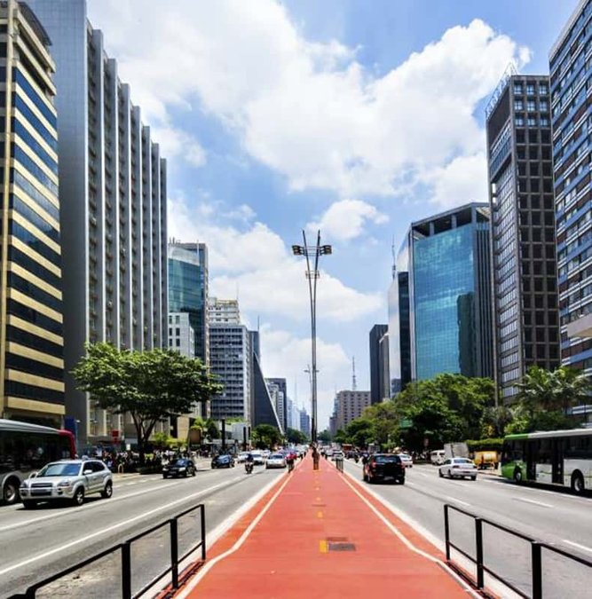Avenida Paulista with its red bike lane and towers