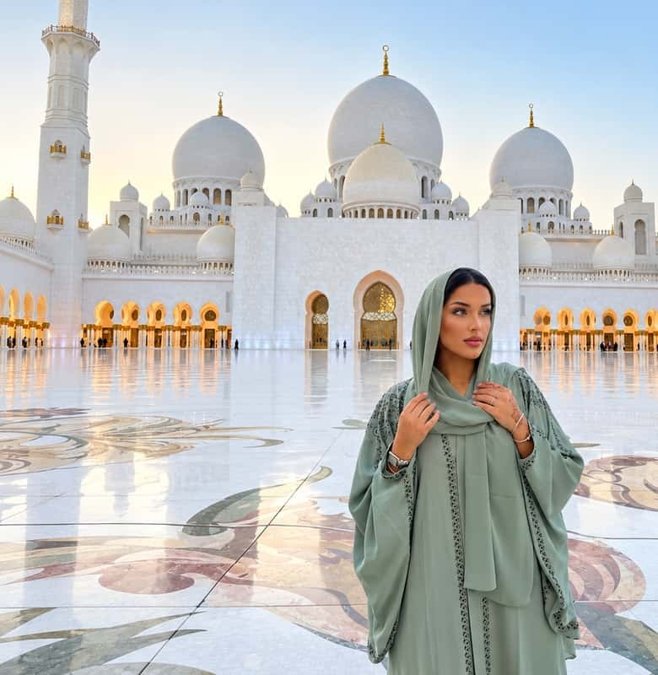 Sheikh Zayed Grand Mosque courtyard with white arches and domes