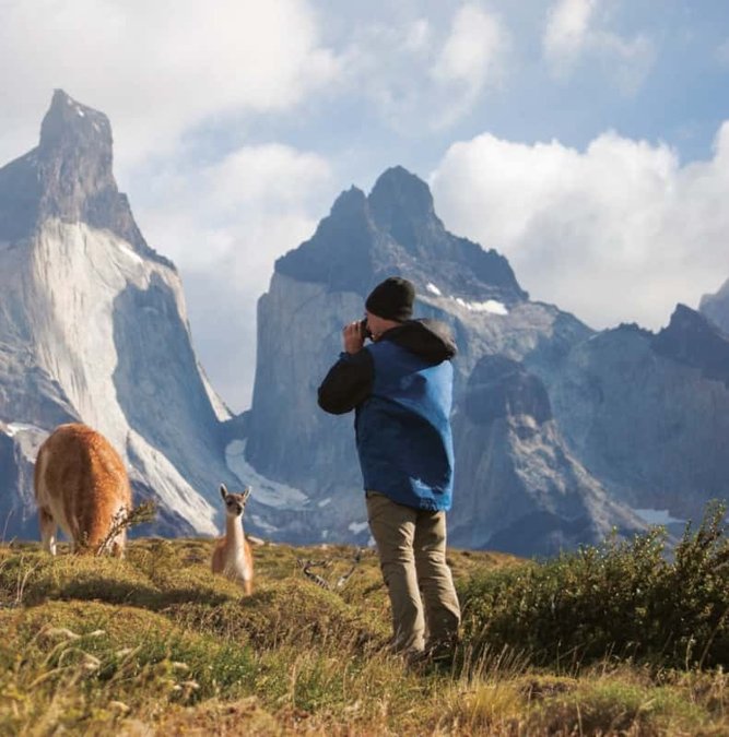 Traveler photographing the Paine horns