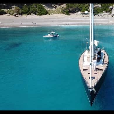 Sailboat anchored in a clear bay near Alcúdia