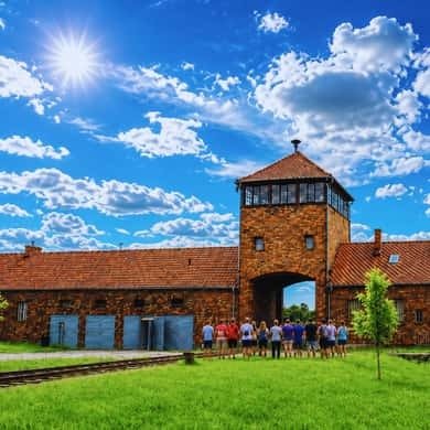 Main guardhouse gate of Birkenau under a blue sky