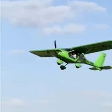 Microlight aircraft flying over Ras Al Khaimah