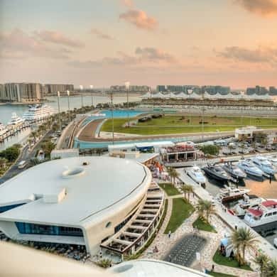 Aerial view of Yas Island with Ferrari World and the marina