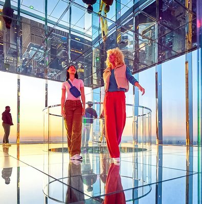 Visitors enjoying the mirrored observation deck at SUMMIT One Vanderbilt, New York City.