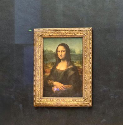 Mona Lisa painting at the Louvre Museum in Paris.